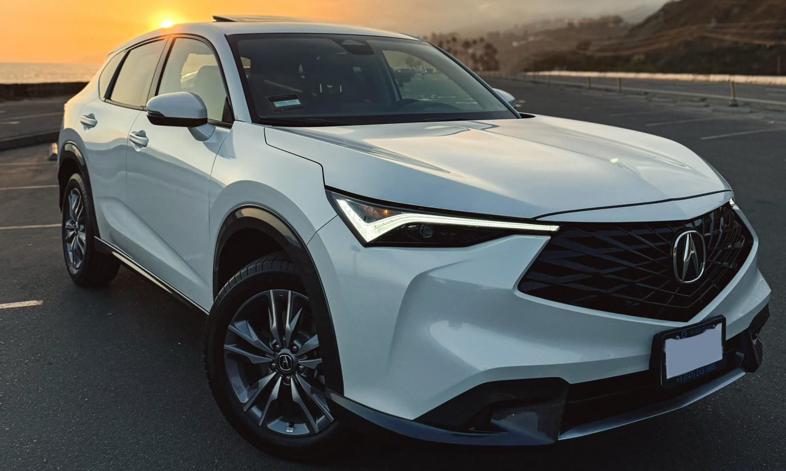 Acura ADX at golden hour on the Los Angeles coast